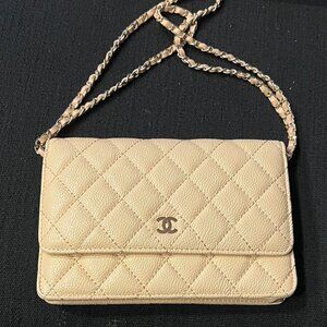 Iconic cream quilted crossbody bag